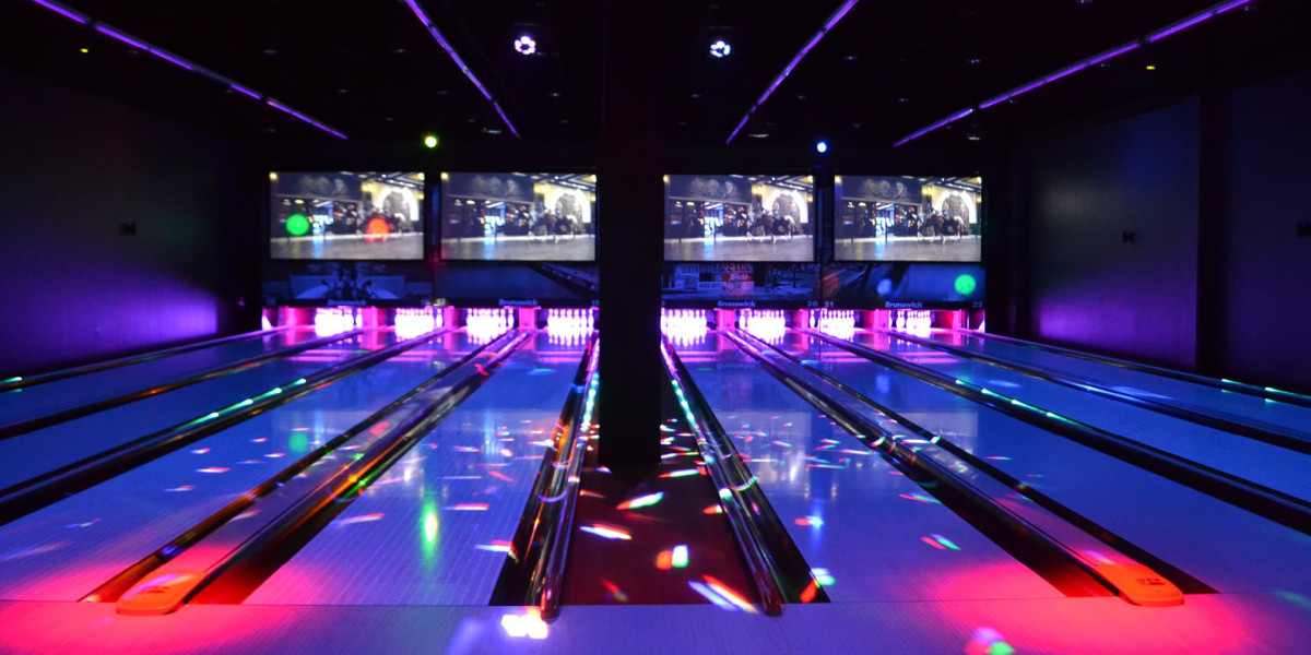 Bowling pins glowing under lasers and black lights