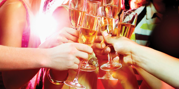 Adults toasting champagne glasses