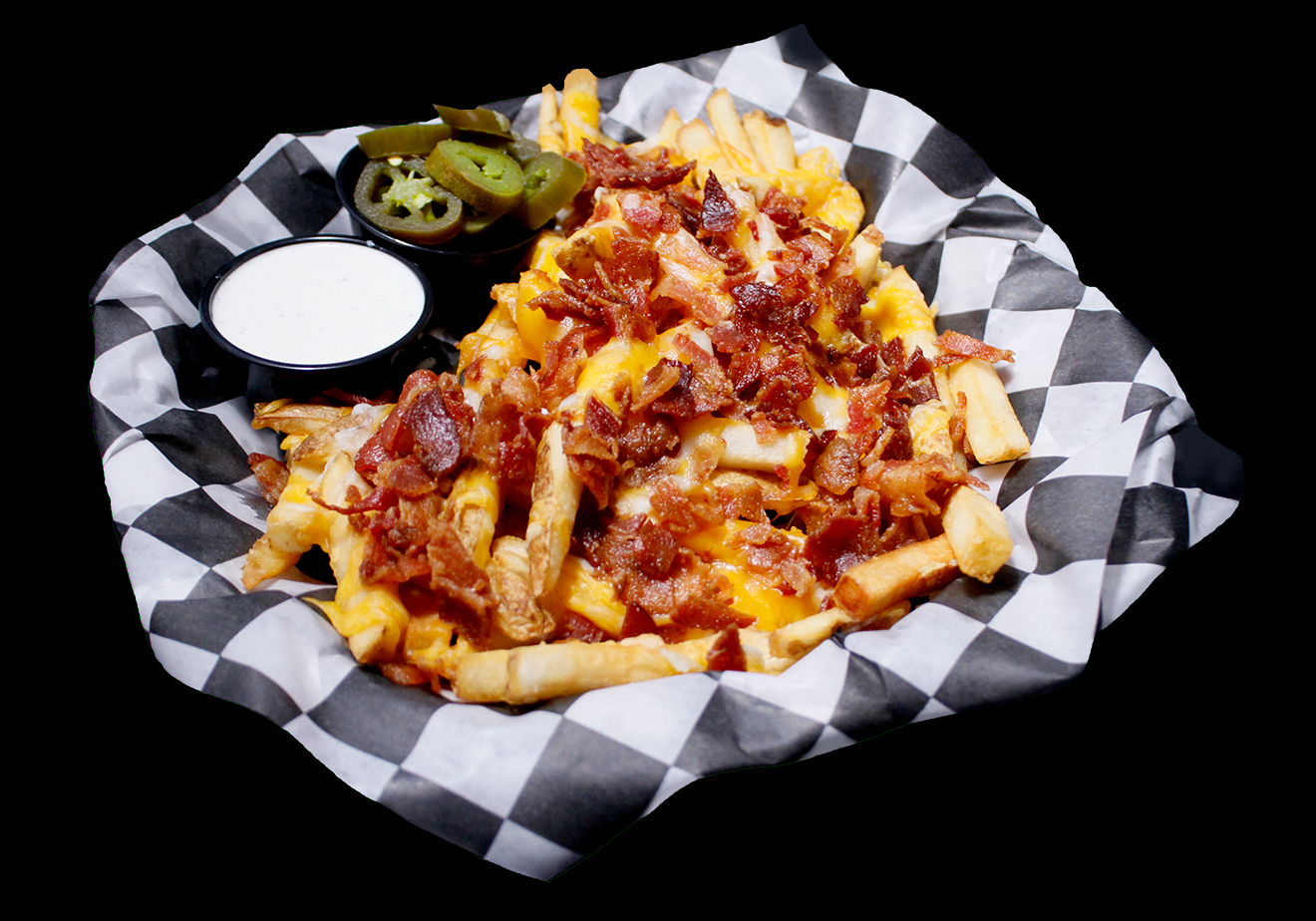 At Spare Time Texas, enjoy a basket of loaded fries topped with melted cheese and crispy bacon on black and white checkered paper. Accompanied by jalapeños and creamy dipping sauce, this savory delight is perfect for fueling your family fun center adventures or after a competitive game of bowling.