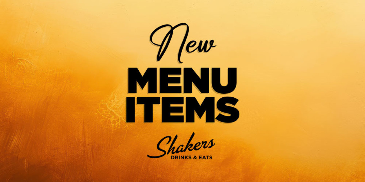 Text on a warm, textured orange background reads: "New Menu Items" in bold black letters, with "Shakers Drinks & Eats" in smaller script below. Perfect for enjoying after a thrilling game of bowling at Spare Time Texas!.
